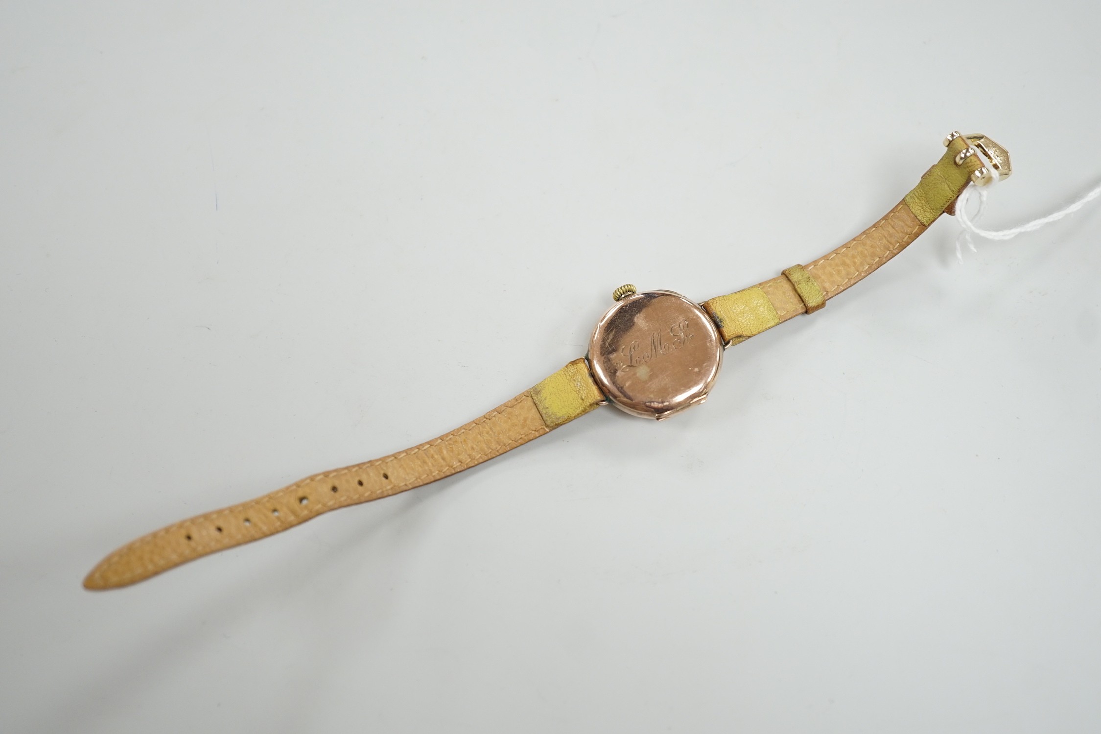 A gentleman's George V 9ct gold Rolex manual wind wrist watch, with Arabic dial, case hallmarked for London, 1915, the case back with engraved initials, on a later associated leather strap, case diameter 28mm.
